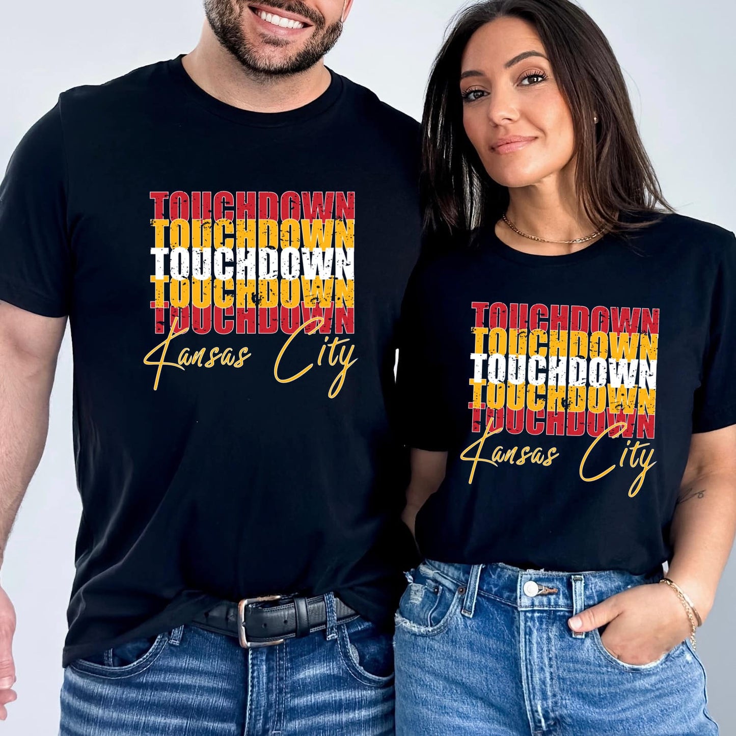 Photo is a mock up of the design. Design is colored and pressed on a black shirt. Design says touchdown 5 different times and then says Kansas City.