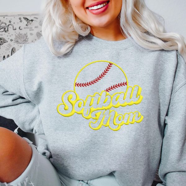 Photo is a mock up of the design. This design is a puff print and will raise and be puffy once pressed. Design is a fluorescent yellow and has red threads for the softball. Design says softball mom with a softball.