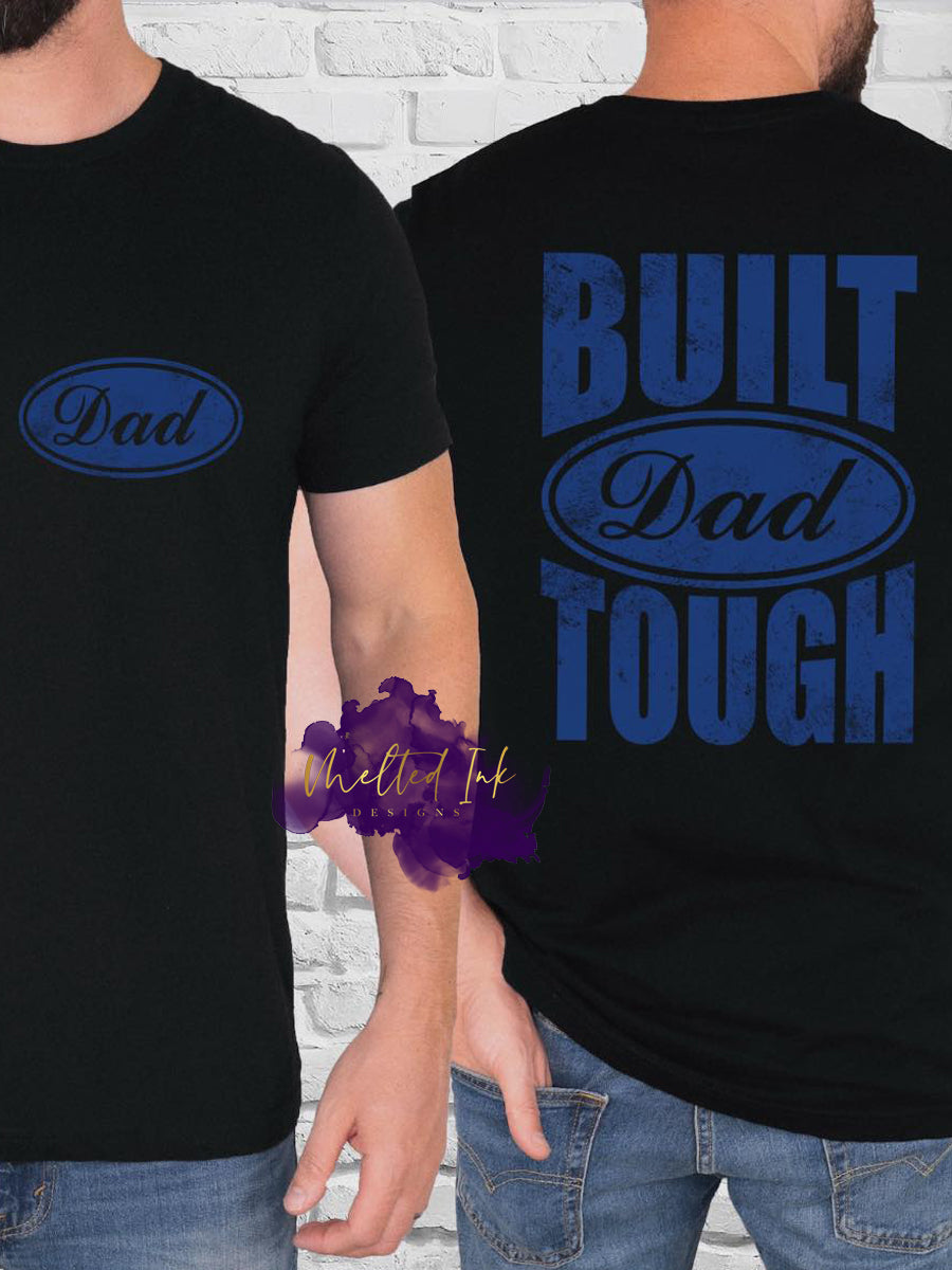 T-shirt with blue “Dad” logo on the front and bold “Built Dad Tough” text graphic on the back, perfect for Father’s Day, dad gifts, or everyday dad apparel.
