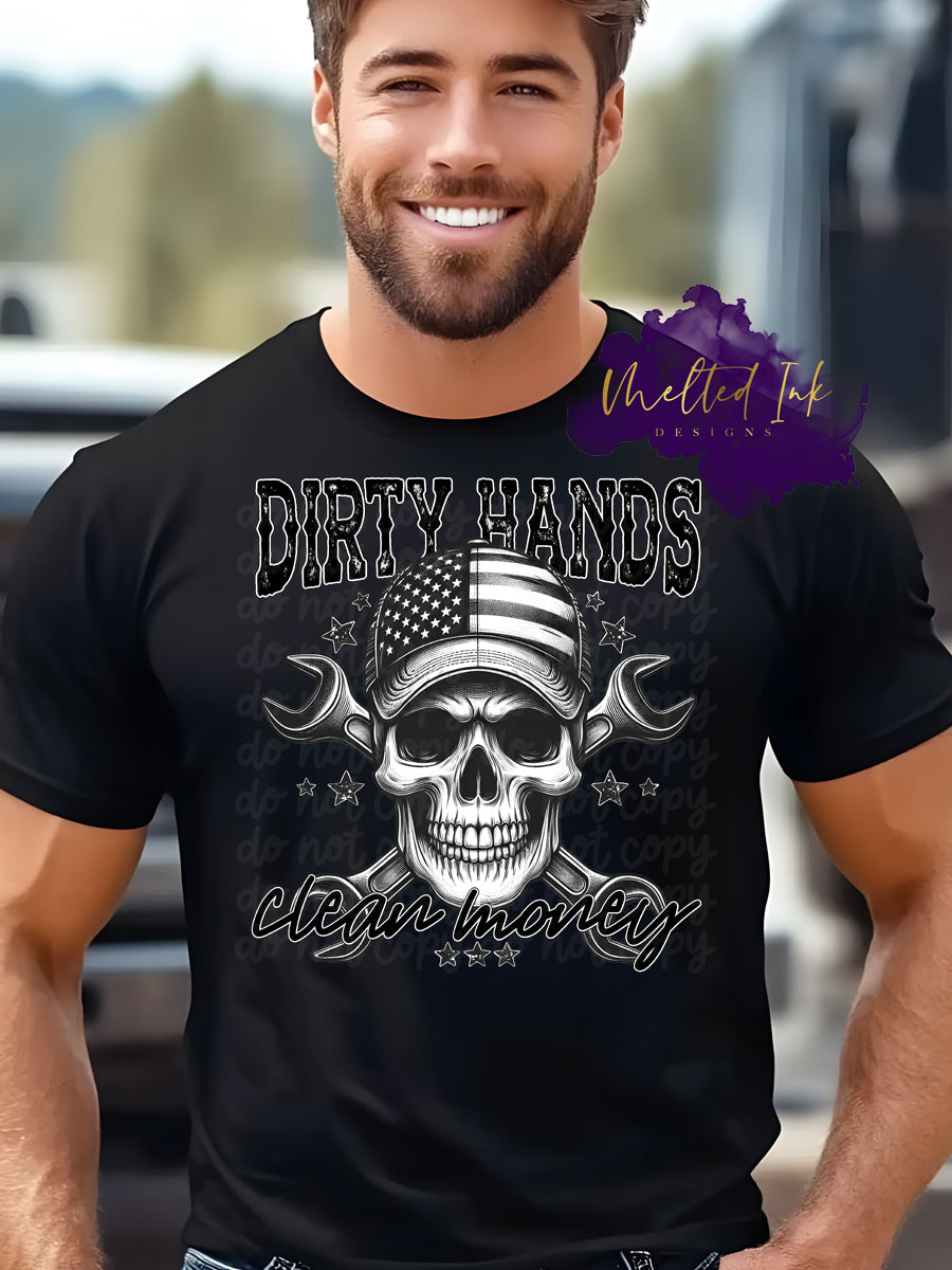 T-Shirt design pictured is a mock up on a black t-shirt. Design says Dirty hands clean money. The picture is black and white and has picture of a skull that has an american flag hat on. Behind the skull there is two wrenches in an X position.