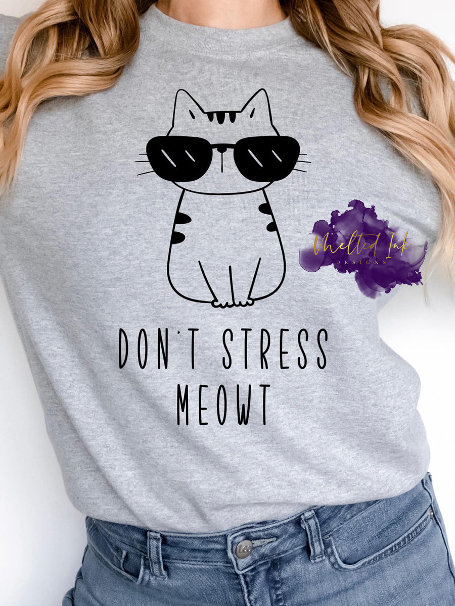 Don't Stress Meowt" shirt featuring a cool cat with sunglasses. A fun and playful cat design perfect for cat lovers who appreciate funny and relaxed shirts. Ideal for casual wear and a great way to showcase your laid-back attitude with a humorous touch.