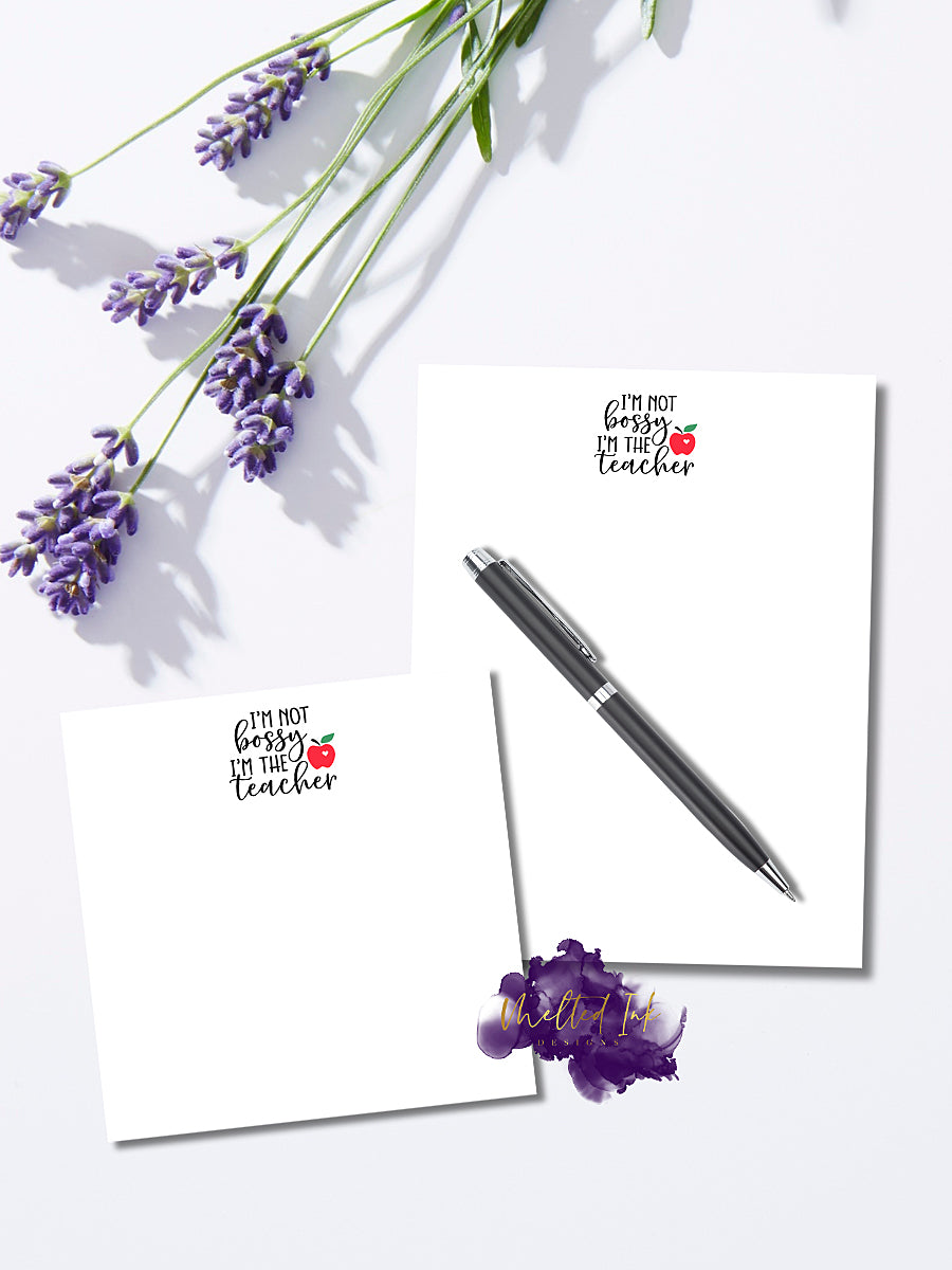 Notepad featuring the phrase 'I'm Not Bossy, I'm the Teacher' with a cute red apple icon, perfect for teachers, classroom notes, and fun school supplies.