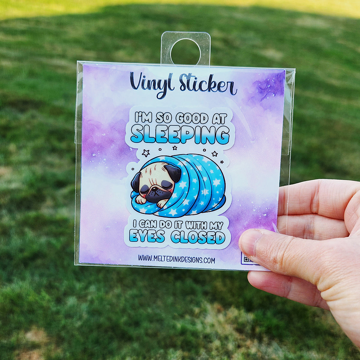Picture is a vinyl sticker with a pug wrapped up in a blue blanket with stars and says I'm So Good at Sleeping I Can Do It With My Eyes Closed.
