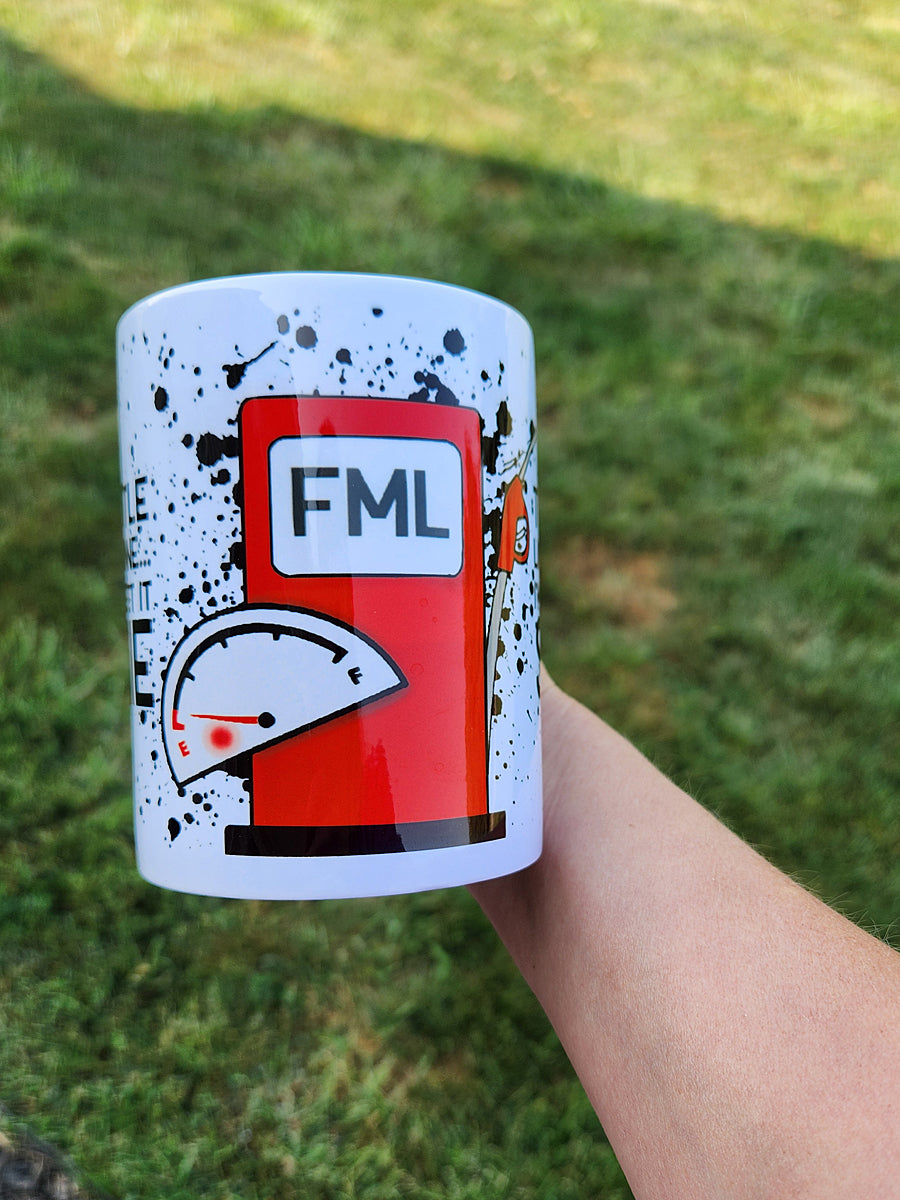 Photo is of a 15oz mug that says this little light of mine...i'm gonna let it shine and has a gas tank with pump almost on empty.