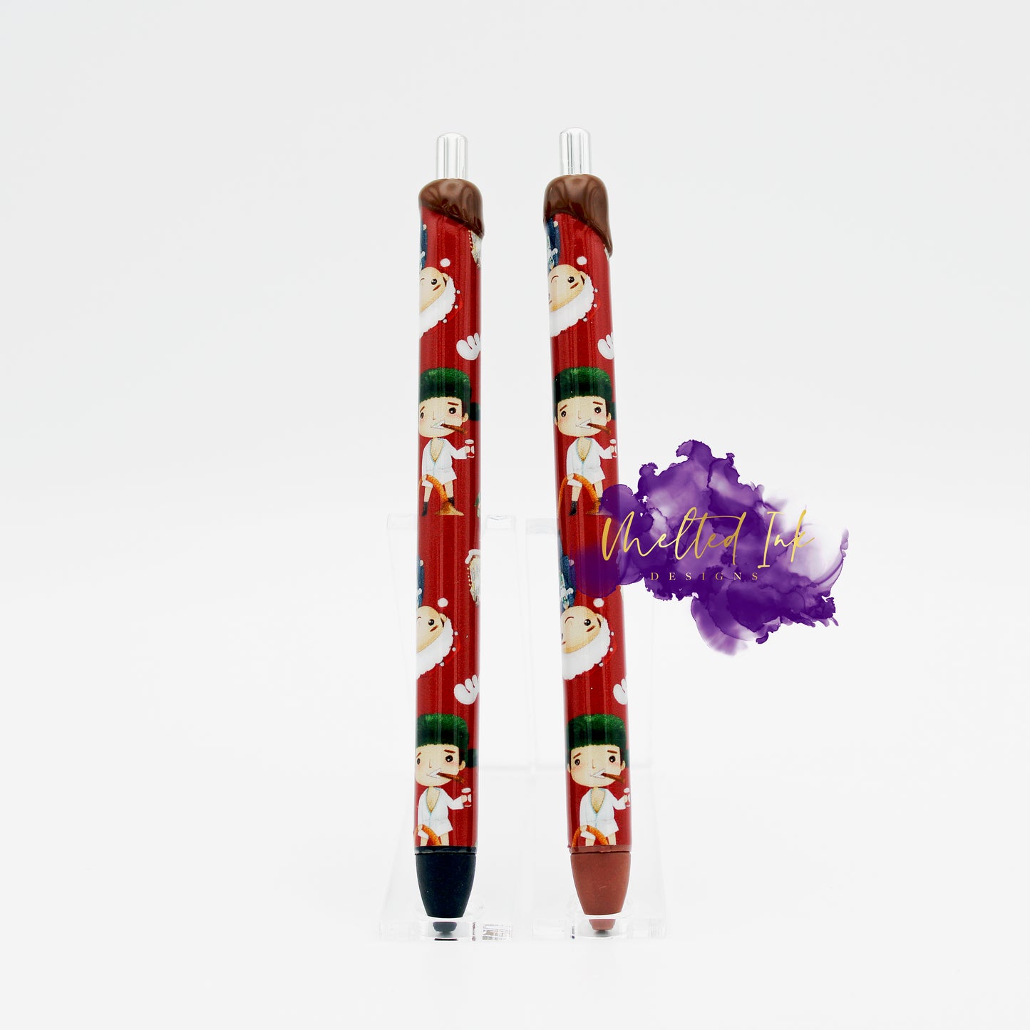 Photo shows 2 epoxy pens with shitters full ink pen wrap. At the top is fake looking poop (made out of puff paint). Choice of having black ink or brown ink.