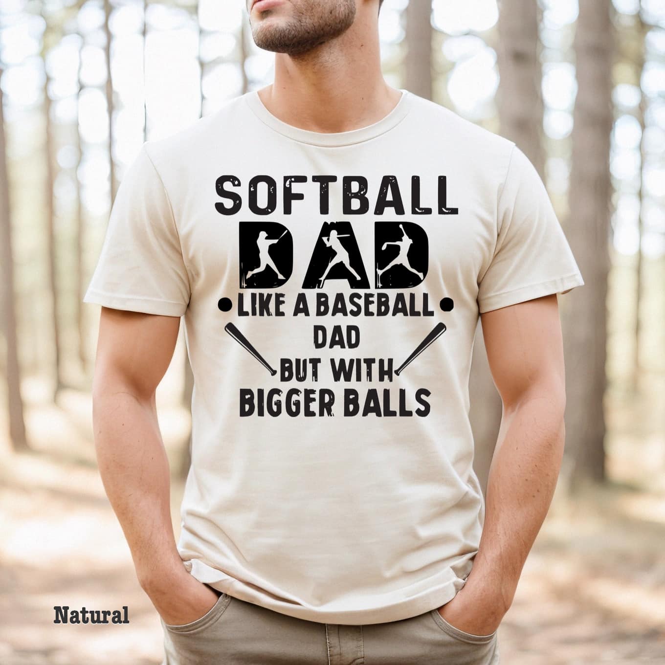 Photo is a mock up of the design. Design print is black and pressed on natural colored shirt. Design says softball dad like a baseball dad but with bigger balls.