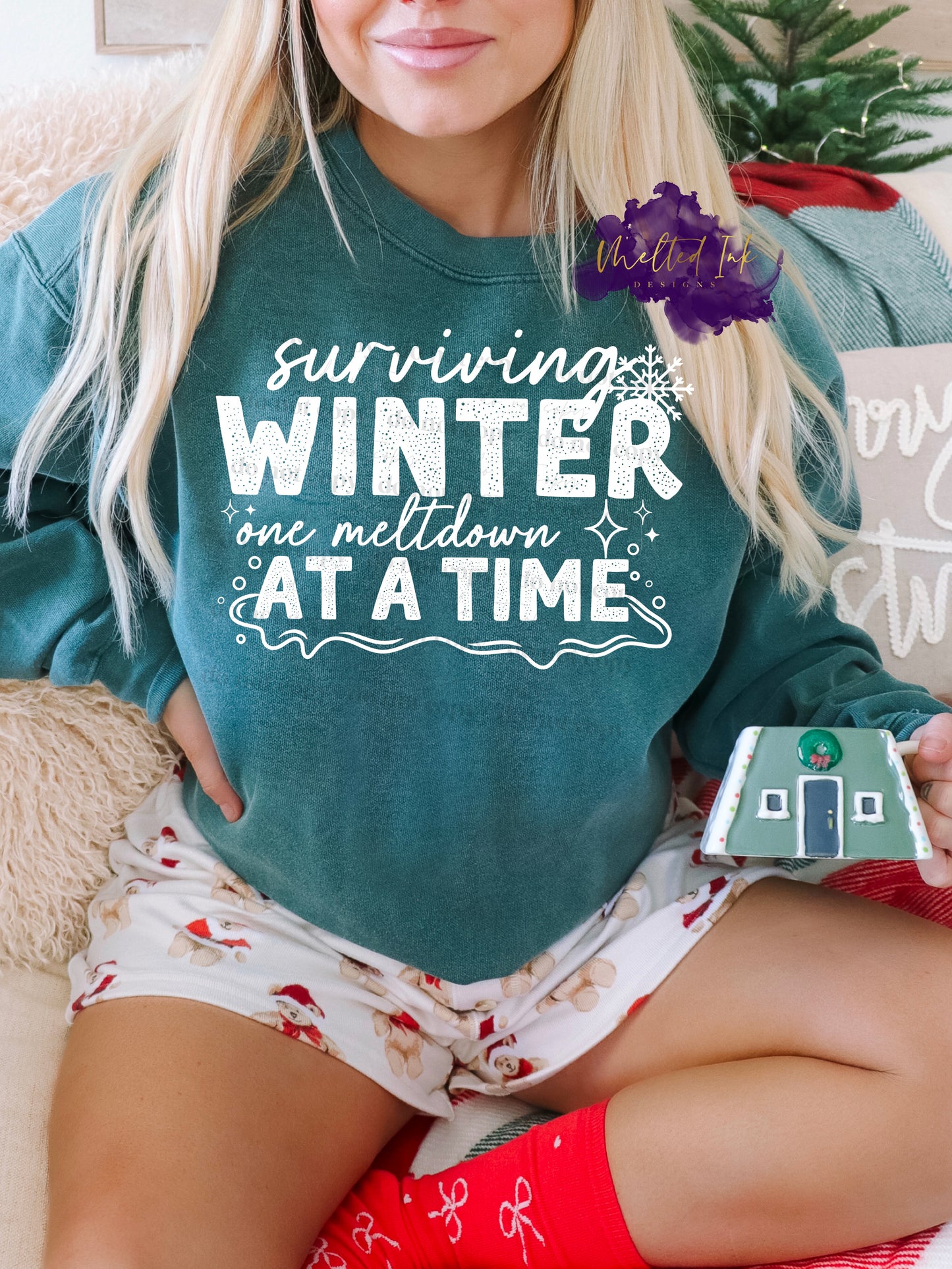 Surviving winter one meltdown at a time. Design is white.