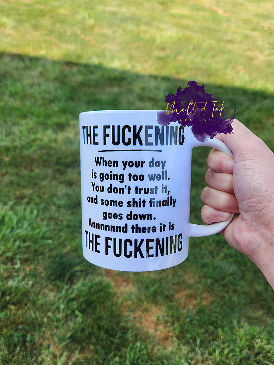 Photo is of a 15oz mug that says the following: The Fuckening When your day is going too well. You don't trust it, and some shit finally goes down. Annnnd there it is The fuckening.