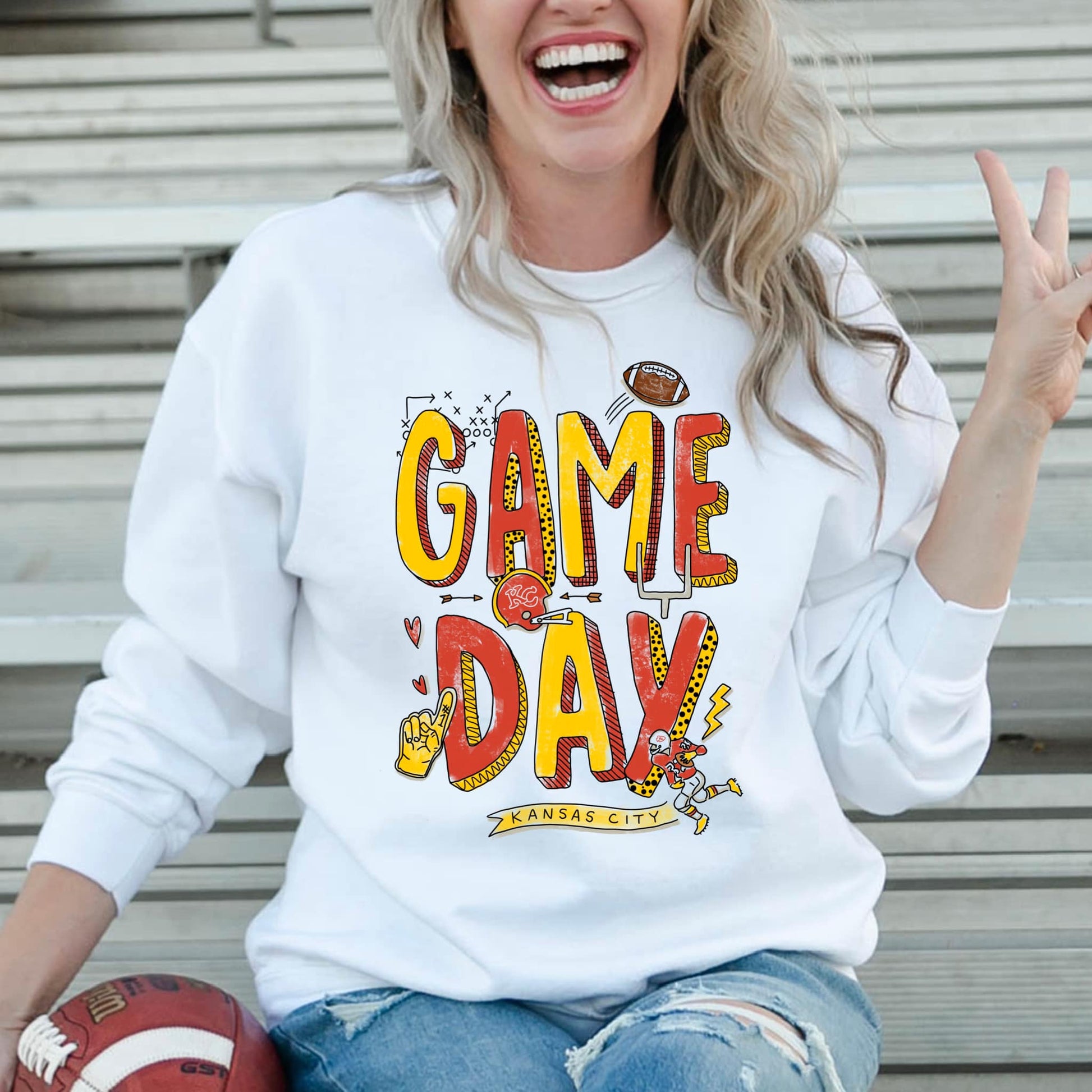 The product photo provided is only a mock up of the design. Design print is yellow/red as in Chiefs colors and Says Game Day Kansas City. 