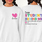 Photo is a mock up of the design.  Design is colored and pressed on a white sweatshirt. Design says Dear student behind me, the word is a better place with you in it. Love the teache rin front of you. Design also has a pocket option which is a a pink heart that says I love my students. 
