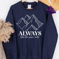 Photo is a mock up of the design. Design print is white and pressed on navy blue sweatshirt. Design says always take the scenic route and has a picture of mountains. 