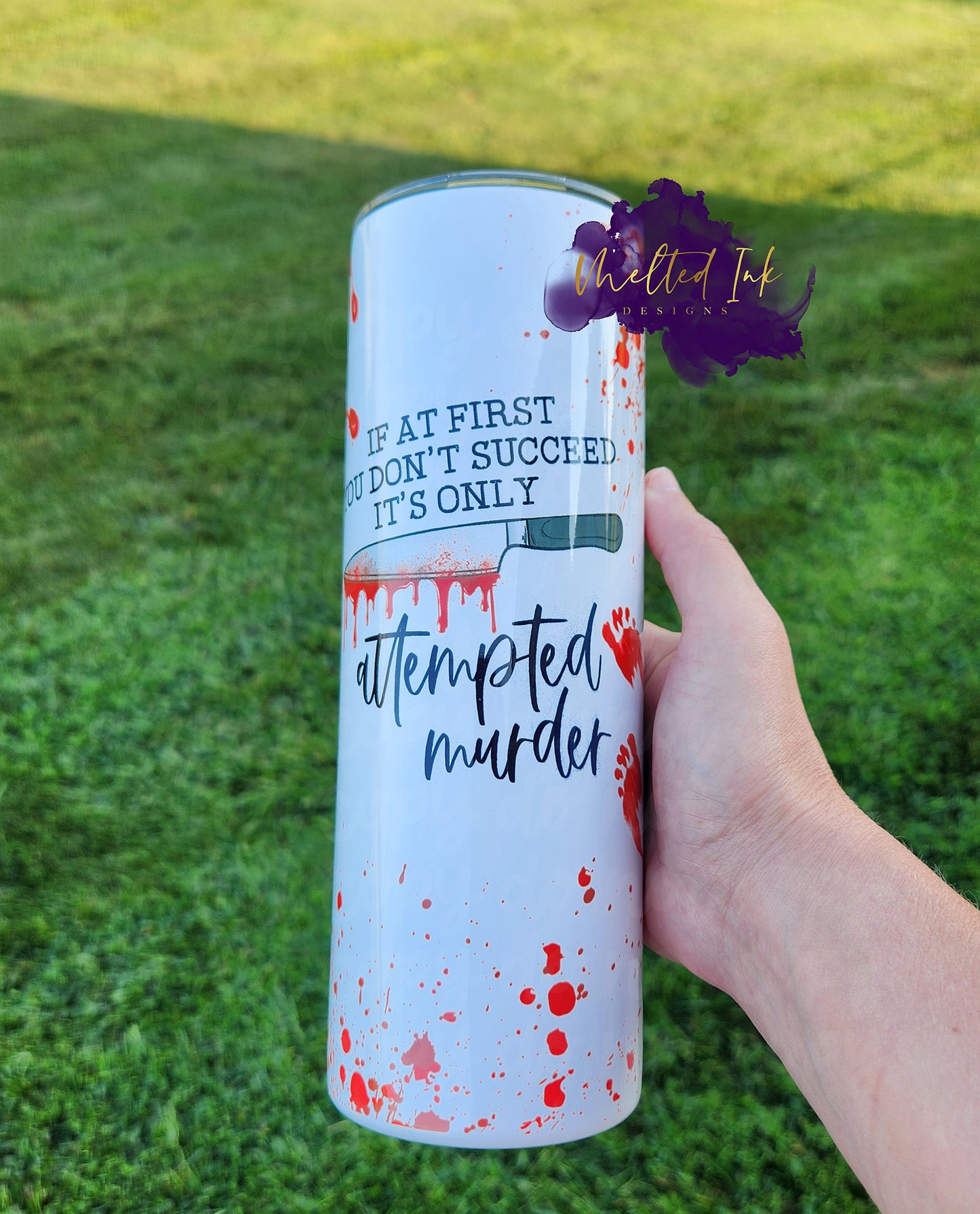 Photo is a 20oz tumbler that says if at first you don't succeed its only attempted murder. Features a knife with fake dripping blood and blood splatters.