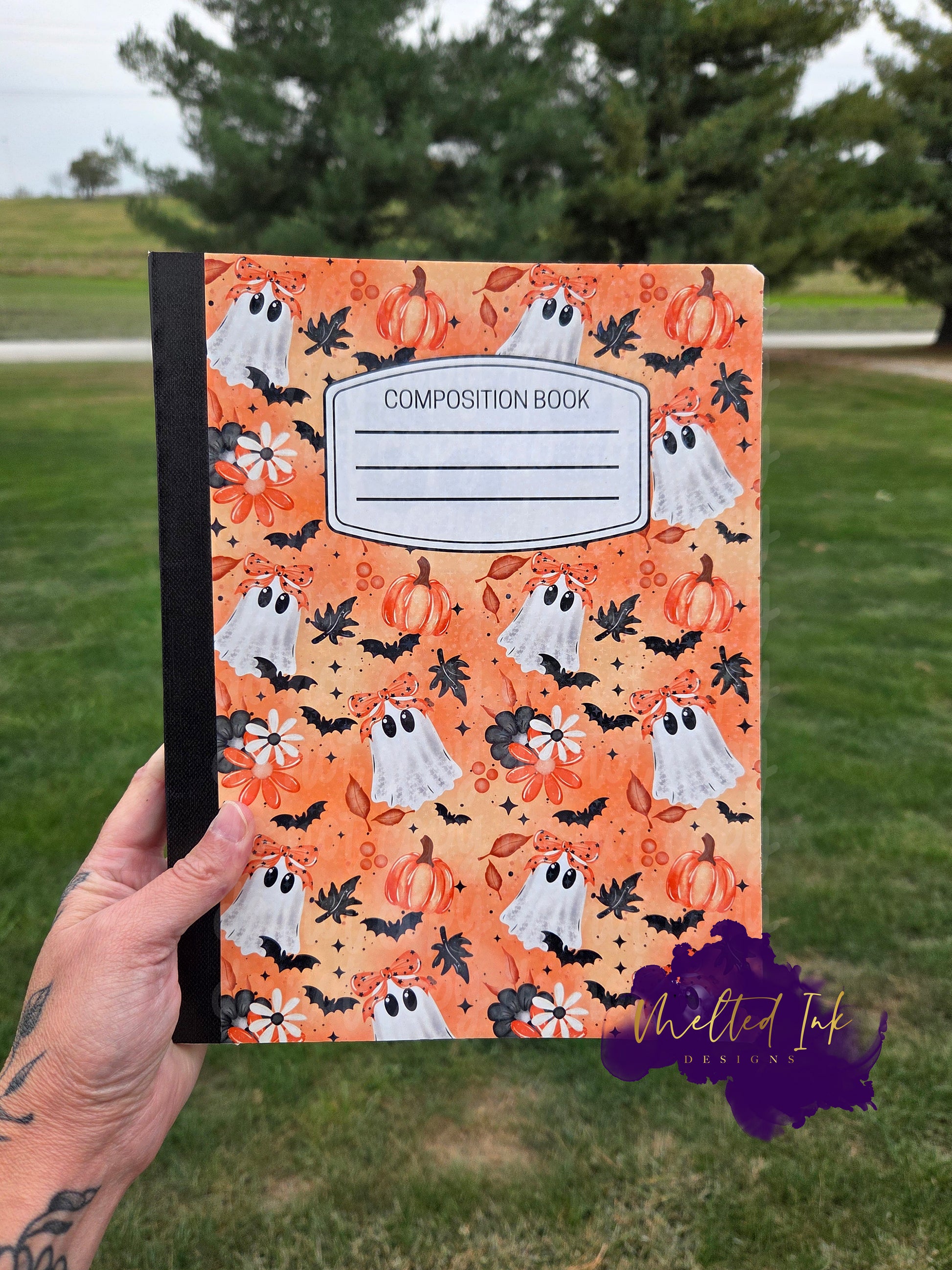 Composition notebook with cute ghost, pumpkin, and floral design. Pen not included.