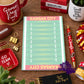 A Kansas City notepad showing a football field. Each end zone says Kansas City. 