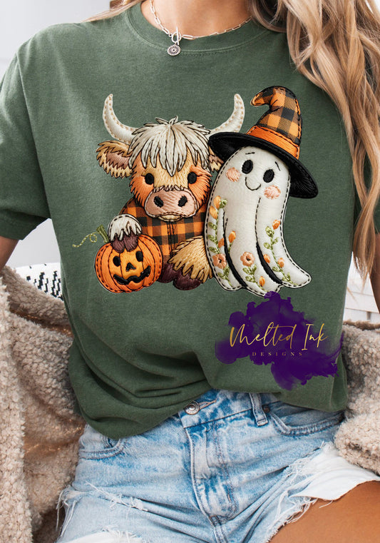 Cute highland cow in a plaid pattern holding a pumpkin, next to a smiling ghost with floral embroidery and a plaid witch hat. The design uses warm fall colors with cozy stitched textures.