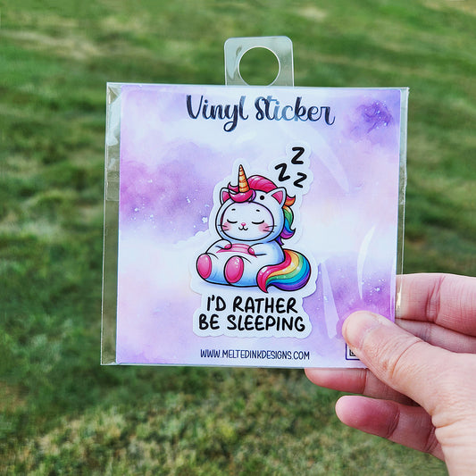 Vinyl sticker with a unicorn sleeping. Sticker says I'd rather be sleeping