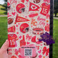 Pink, Red and Gold Kansas City football-themed composition notebook featuring football helmets, footballs, jerseys, bows, pom-poms, hearts, stadium illustrations, and game day-inspired artwork surrounding a pink composition book label.