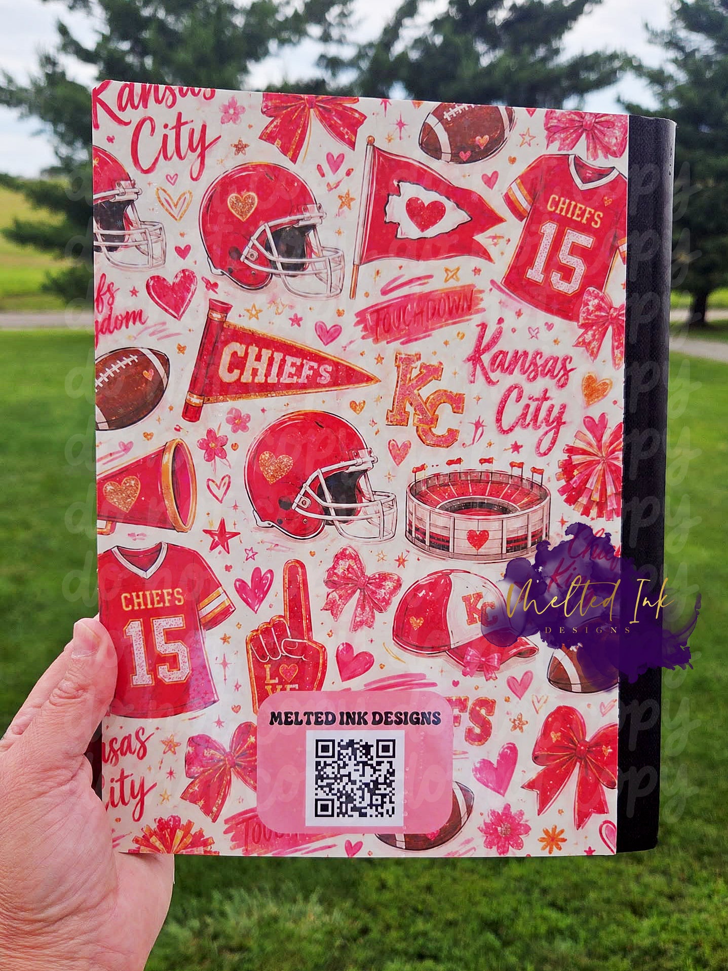 Pink, Red and Gold Kansas City football-themed composition notebook featuring football helmets, footballs, jerseys, bows, pom-poms, hearts, stadium illustrations, and game day-inspired artwork surrounding a pink composition book label.