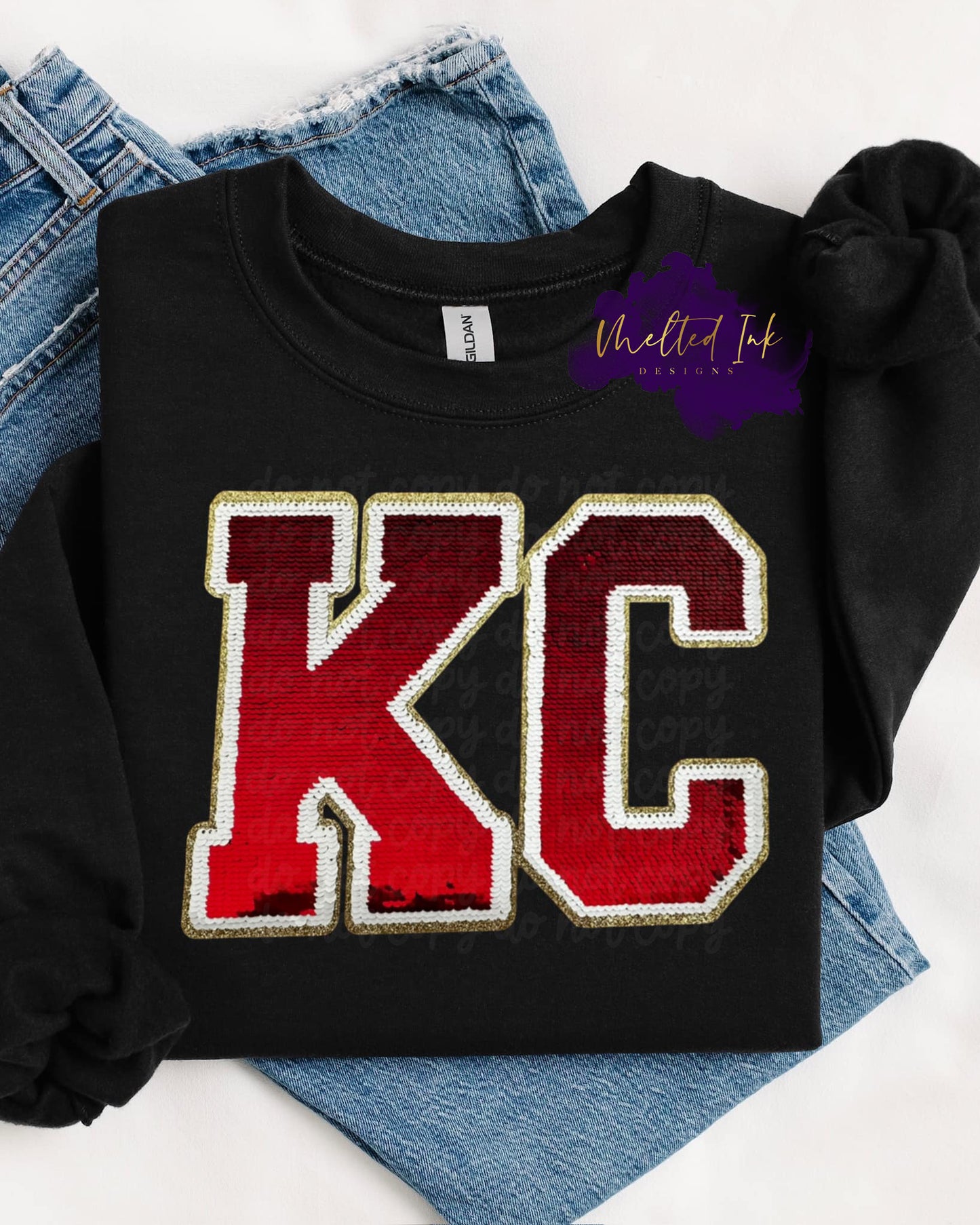 Photo is a mock up of design on a black sweatshirt. Design is of the letters KC with red sequins outlined with white sequins with a trim of gold. 