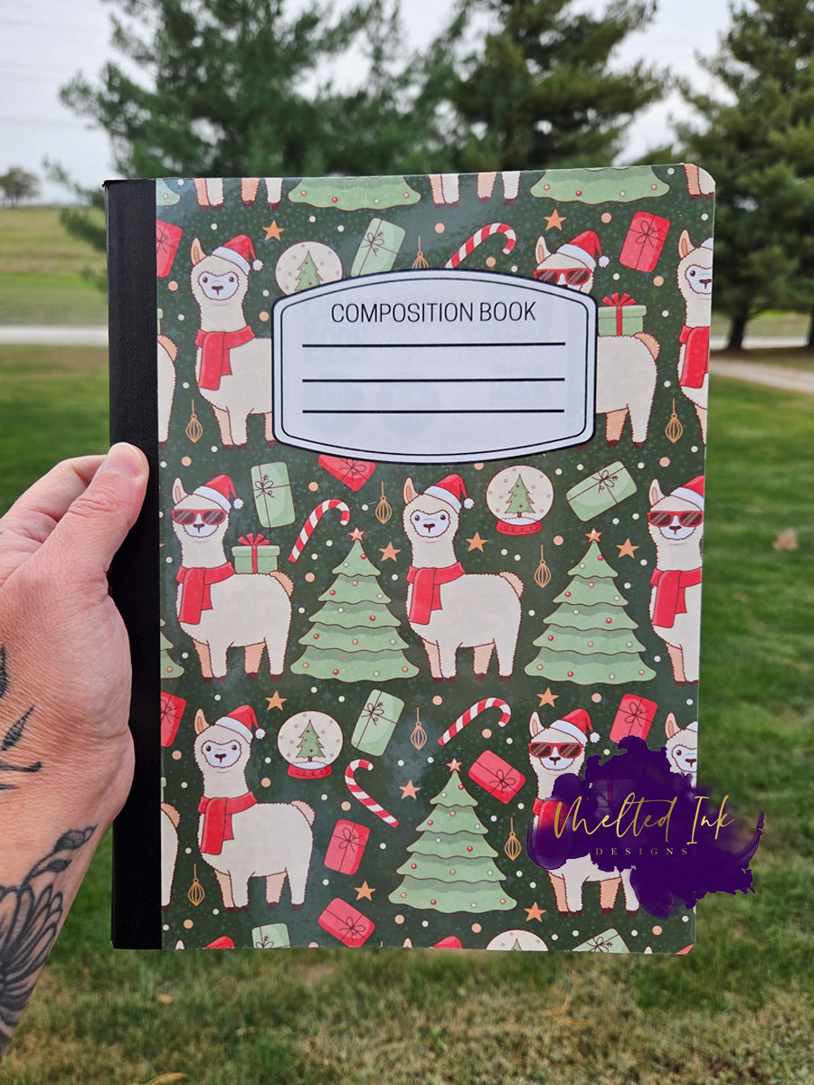 Christmas llama composition notebook with festive trees, gifts, and candy cane design.