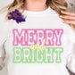 Photo is a mock up of the design and says Merry & Bright in neon color of pink and green. 