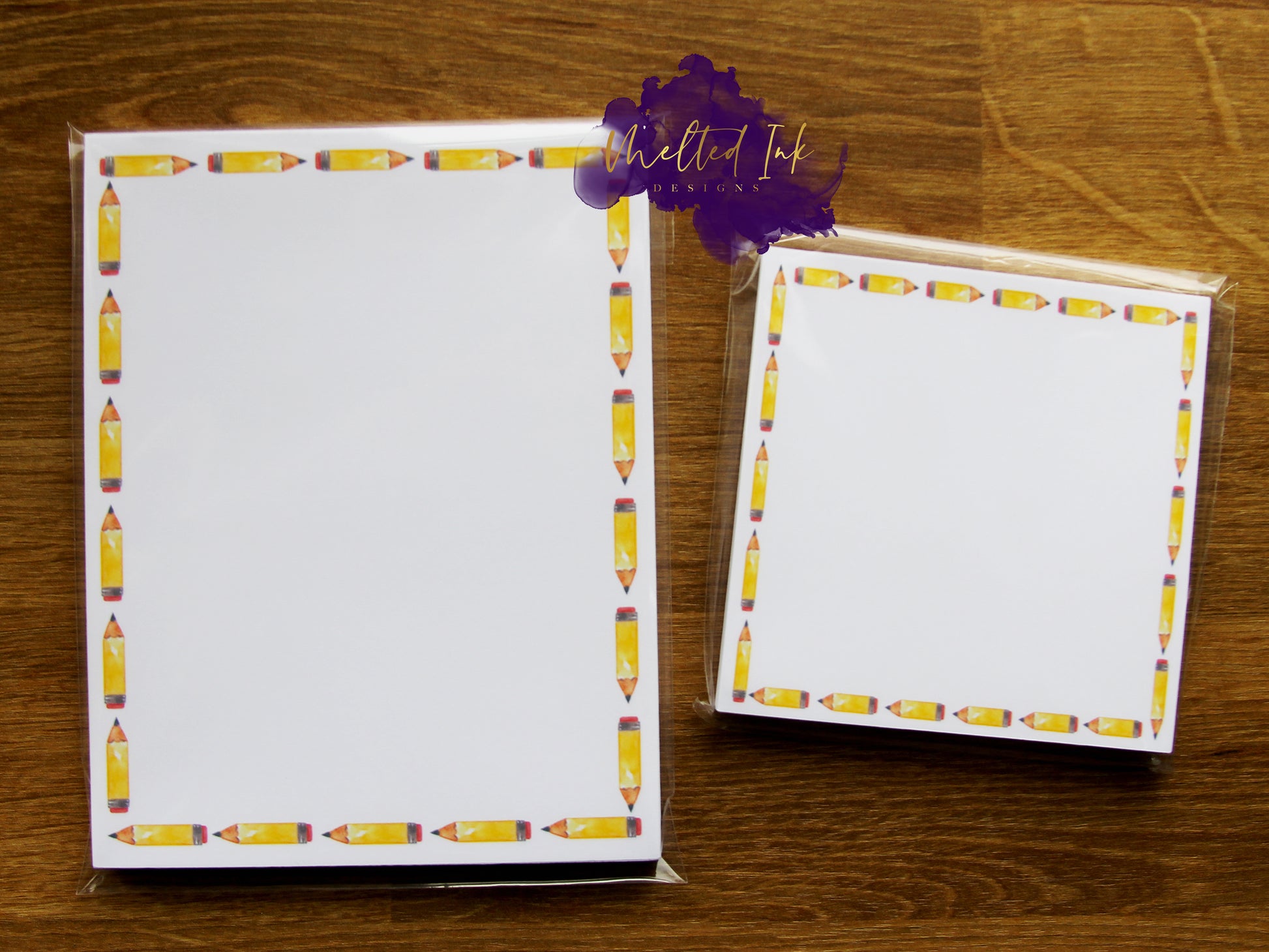 Photo is a picture of both the 4.25x5.5 and the 3.5x3.5 notepad that has a pencil border around it. 