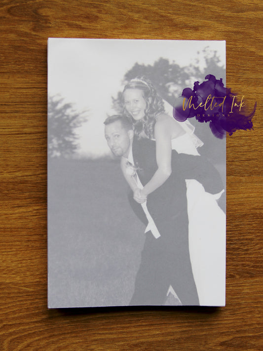 Photo is of a 4x6 notepad that can be customized with picture. 