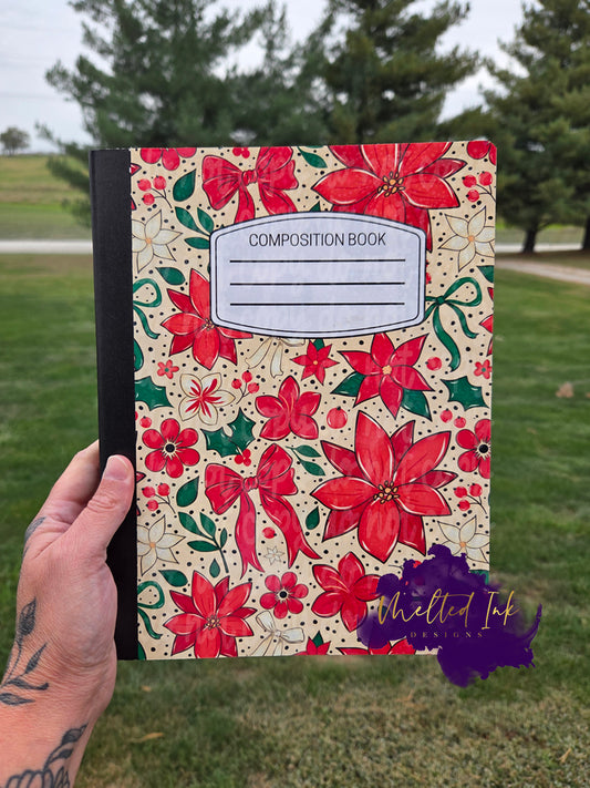 Poinsettia floral Christmas notebook with red flowers, bows, and holly leaves.