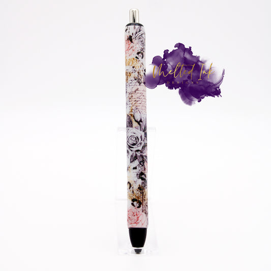 Photo is of an epoxy pen that has a vintage floral wrap and has a glitter overlay. Comes with black ink. 