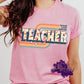 Retro-style "Teacher" t-shirt with floral lettering and the words "Teach Love Inspire"