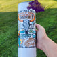 photo showcases a 20oz tumbler that features lyrics from the song "Gettin' Tipsy." The design is accentuated with eye-catching elements related to alcohol, such as drink icons or bottles, and includes a striking cow skull, adding a rustic and bold touch. 