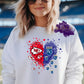 Design is a mock up and is of a heart that is red and blue confetti hearts that says KC Football and KC Baseball teams. 