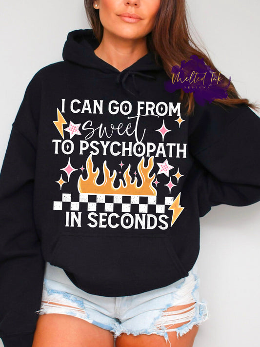 Sarcastic graphic shirt design featuring I Can Go From Sweet To Psychopath In Seconds quote with bold statement lettering. Also includes flames